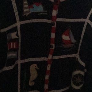 This is a nautical sweater and been worn twice. Good condition.
